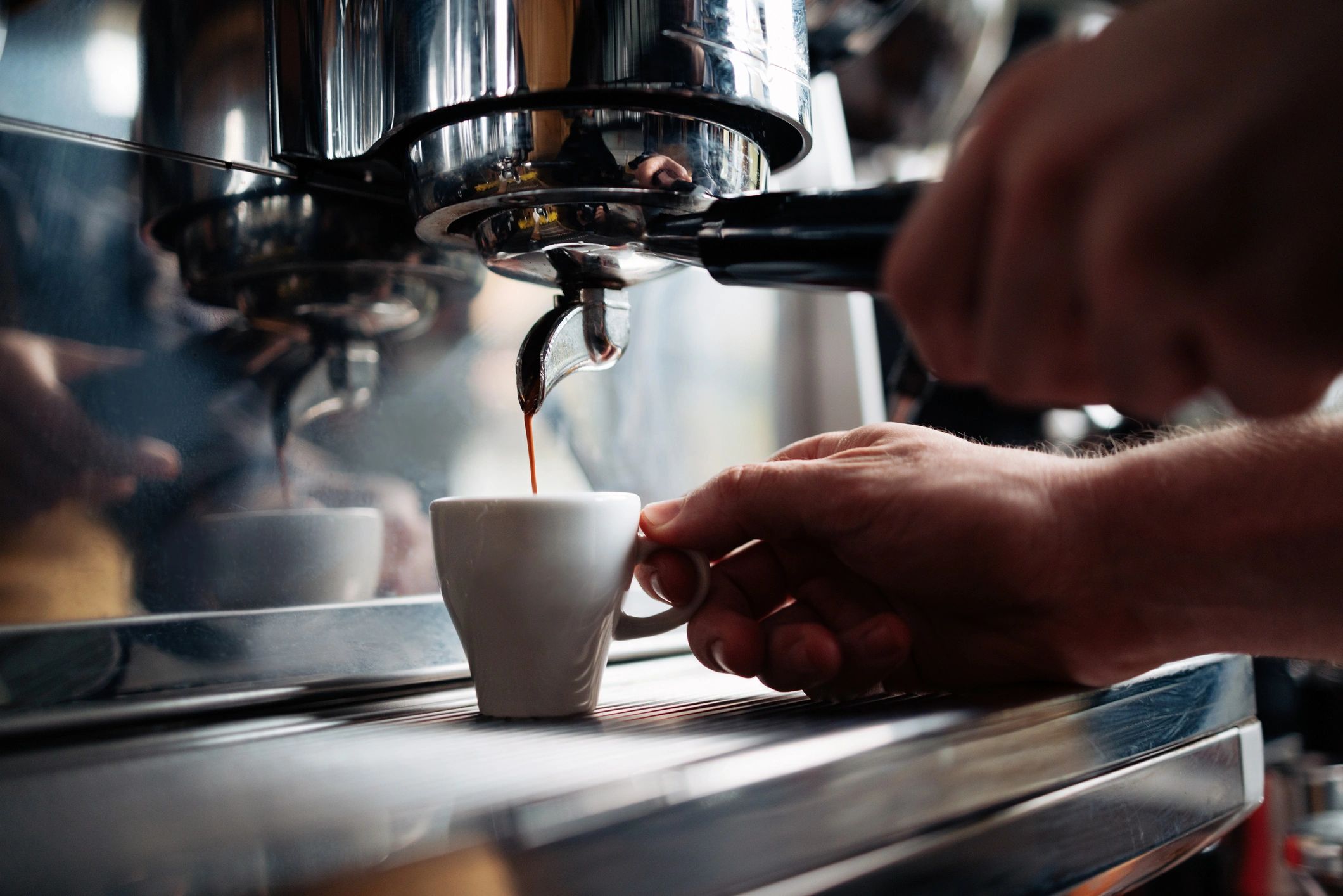 Barista preparing a classic Italian espresso